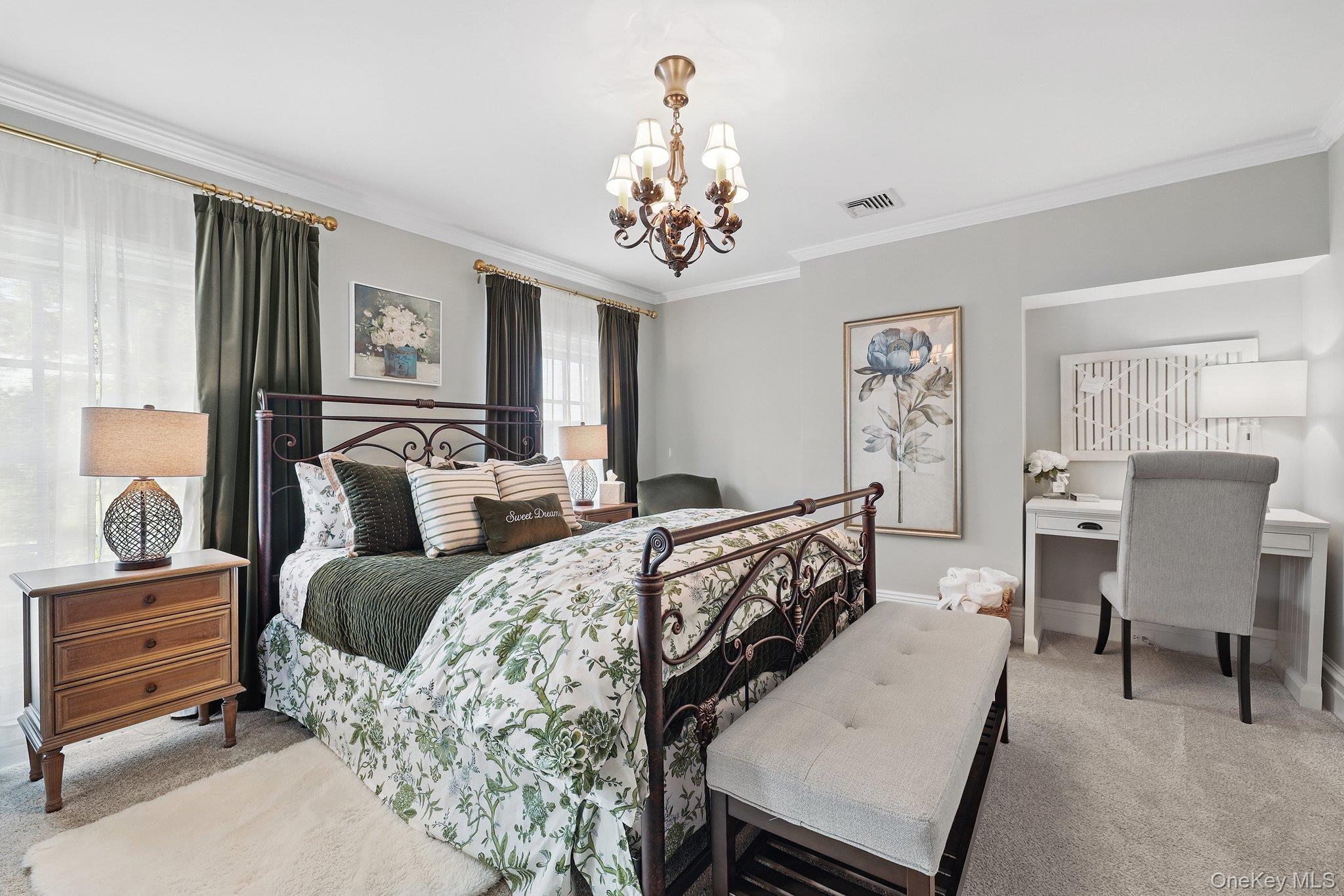 16 State School Road Warwick, NY 10990 - Photo 27 of 50 a bedroom with a bed and a chandelier