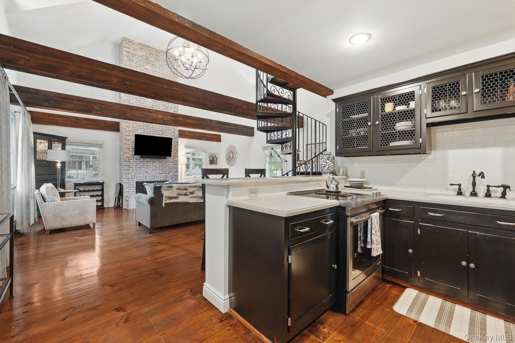 16 State School Road Warwick, NY 10990 - Photo 36 of 50 a kitchen with stainless steel appliances granite countertop a sink stove and cabinets