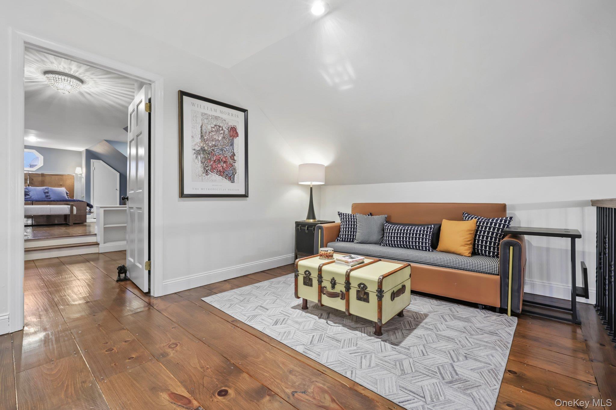 16 State School Road Warwick, NY 10990 - Photo 37 of 50 a living room with furniture and a lamp