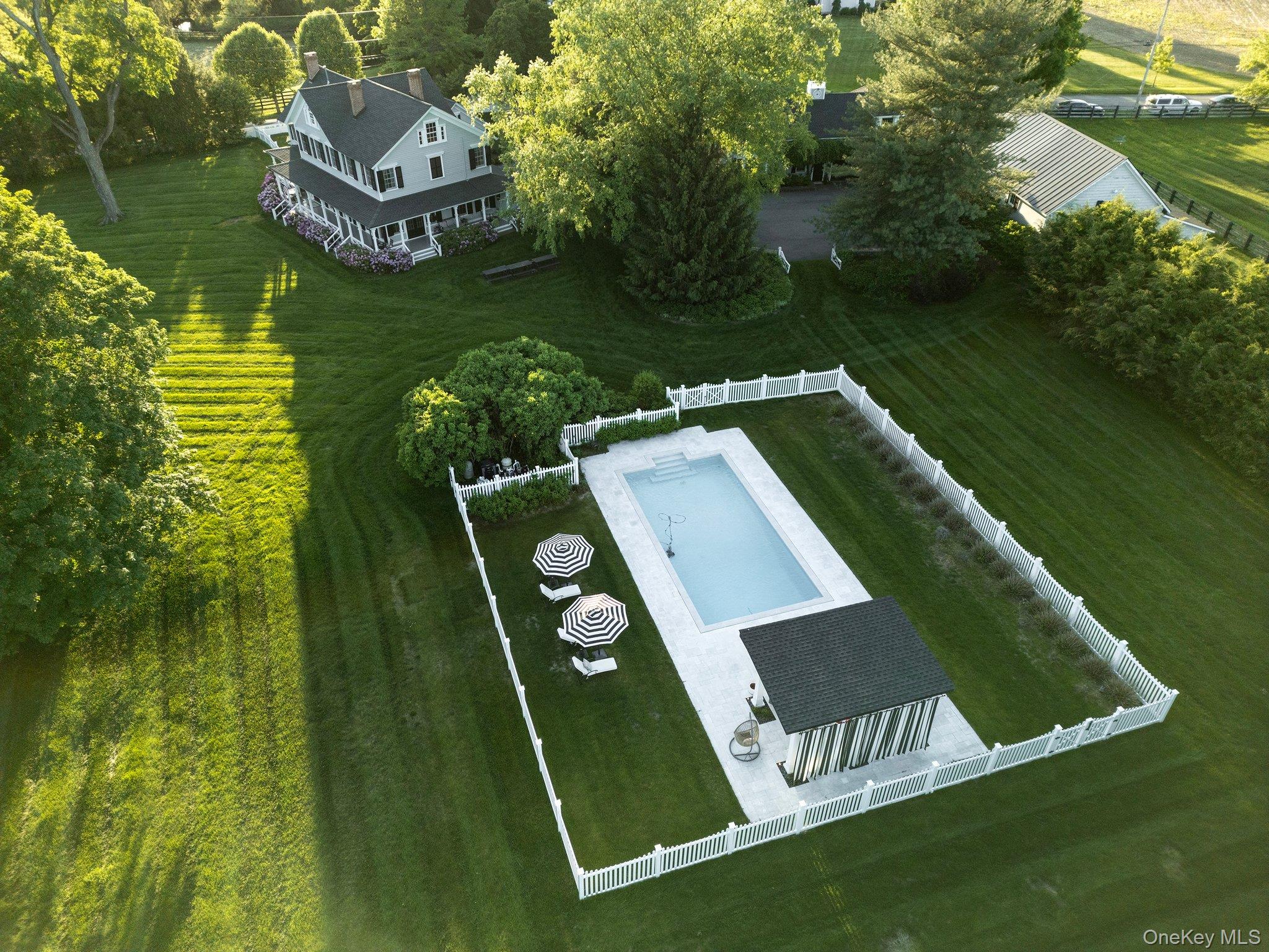 16 State School Road Warwick, NY 10990 - Photo 49 of 50 a view of a swimming pool with a garden