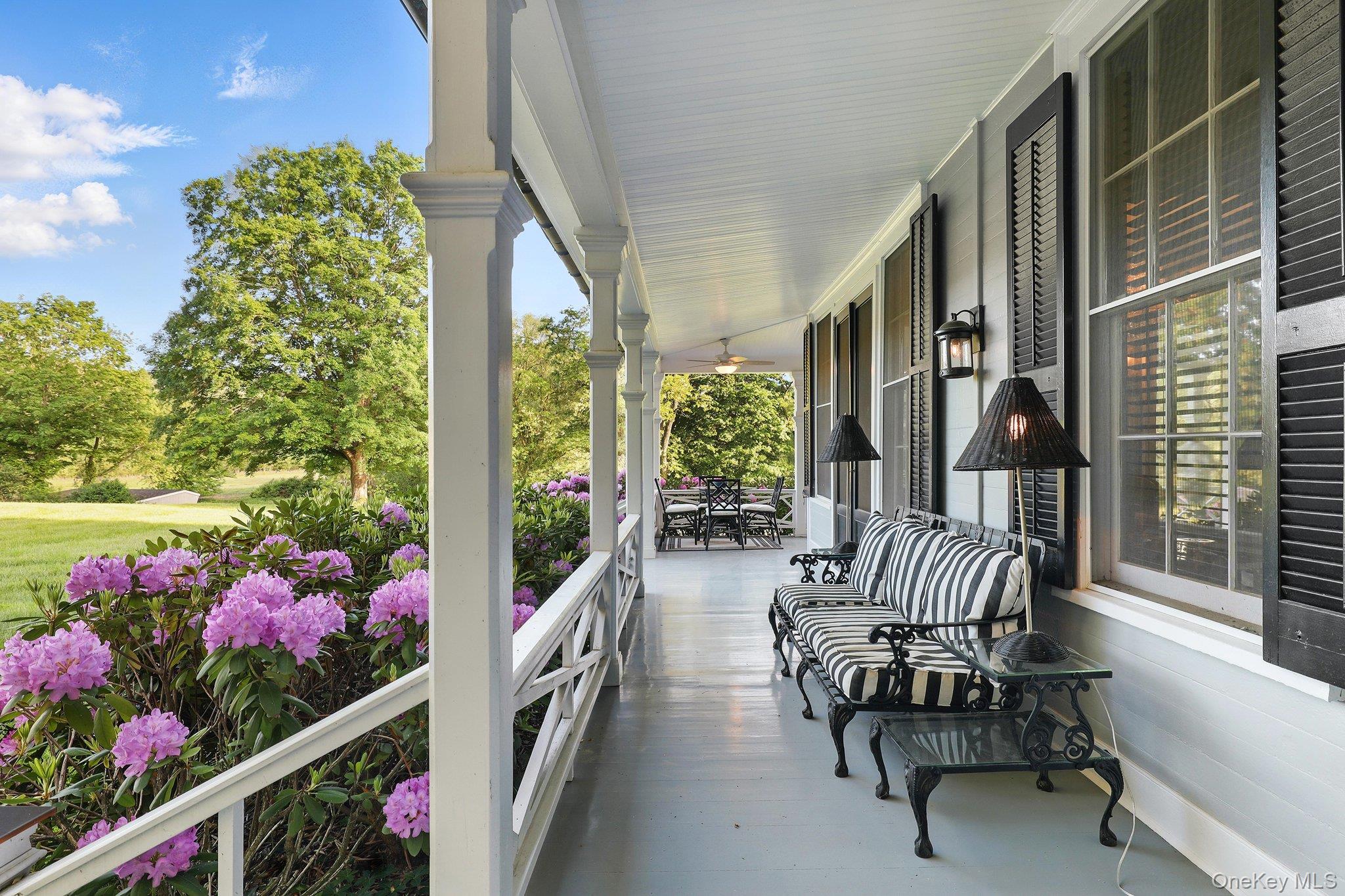 16 State School Road Warwick, NY 10990 - Photo 5 of 50 a view of balcony with furniture and flowers