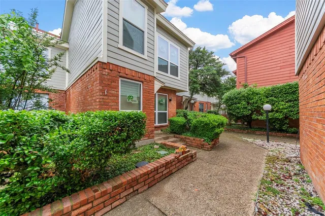a front view of house with a yard