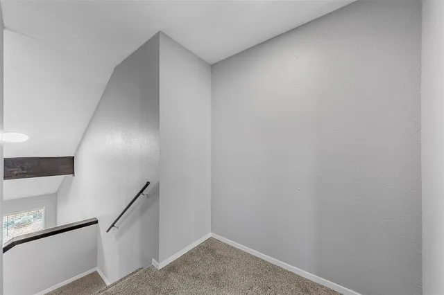 a view of hallway with stairs