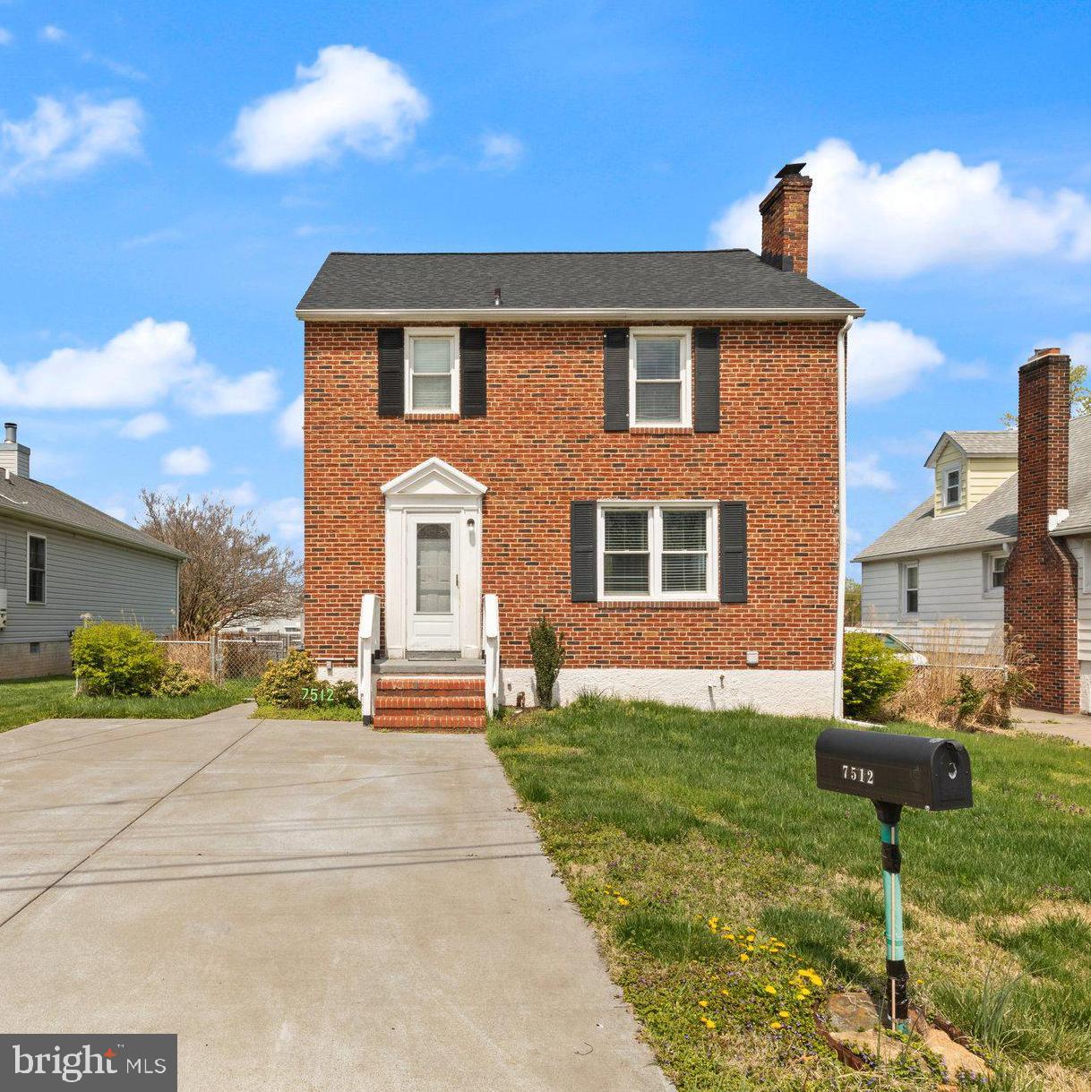 7512 Brightside Avenue Baltimore, MD 21237 - Photo 2 of 32 a front view of a house with garden