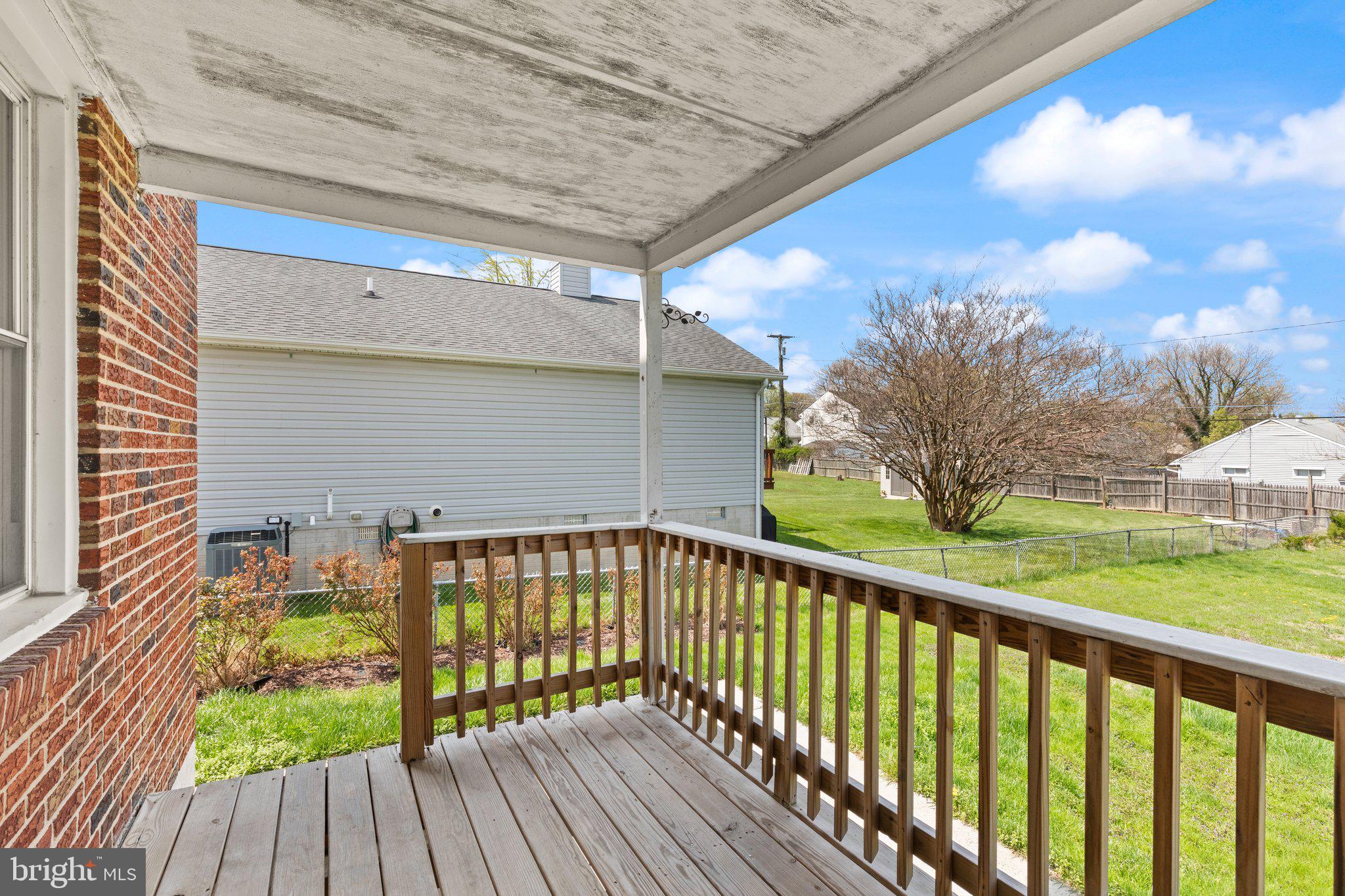 7512 Brightside Avenue Baltimore, MD 21237 - Photo 25 of 32 a view of balcony with wooden floor