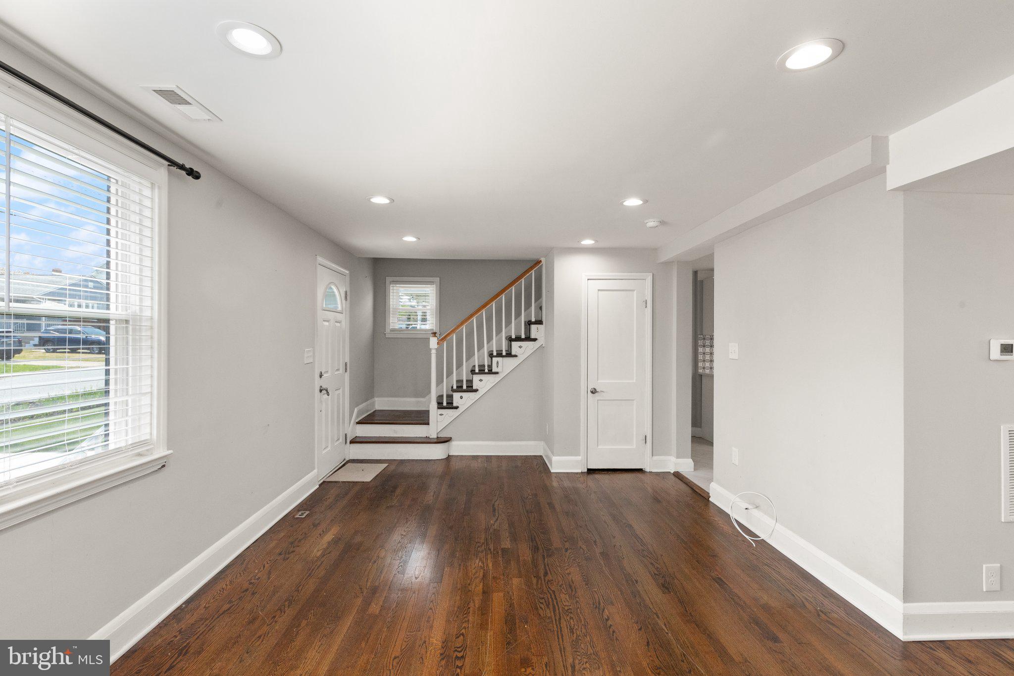 7512 Brightside Avenue Baltimore, MD 21237 - Photo 4 of 32 a view of entryway with wooden floor