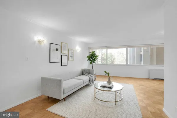 a living room with furniture and window