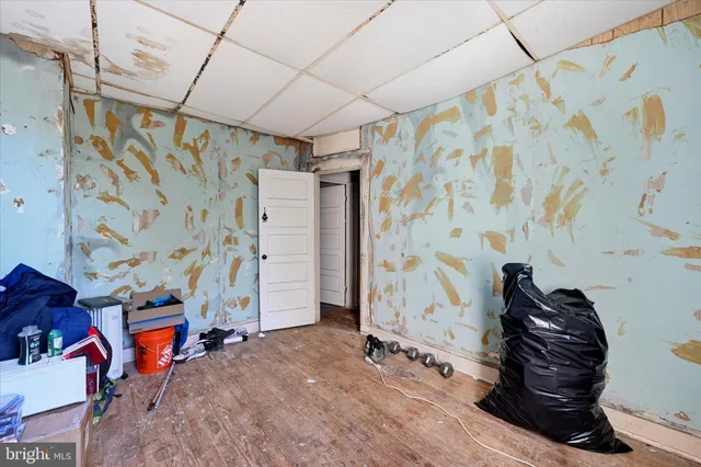 a living room with blue painted walls