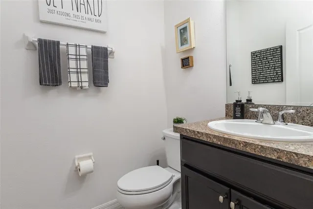 a bedroom with a bed and a bookshelf