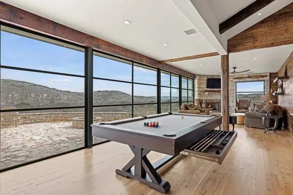 a kitchen with kitchen island a stove a sink and a refrigerator