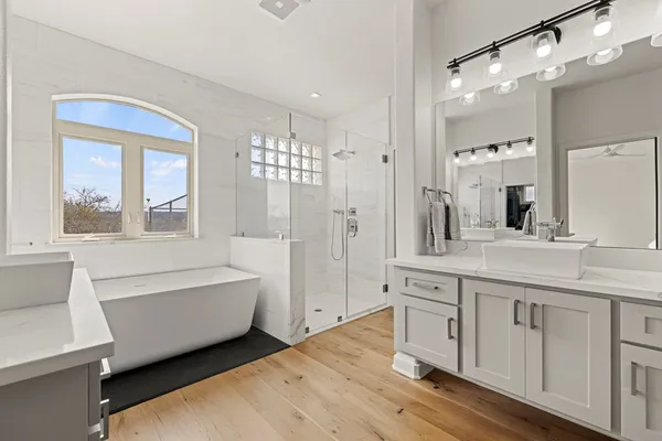 a bed room with a bed and a tv