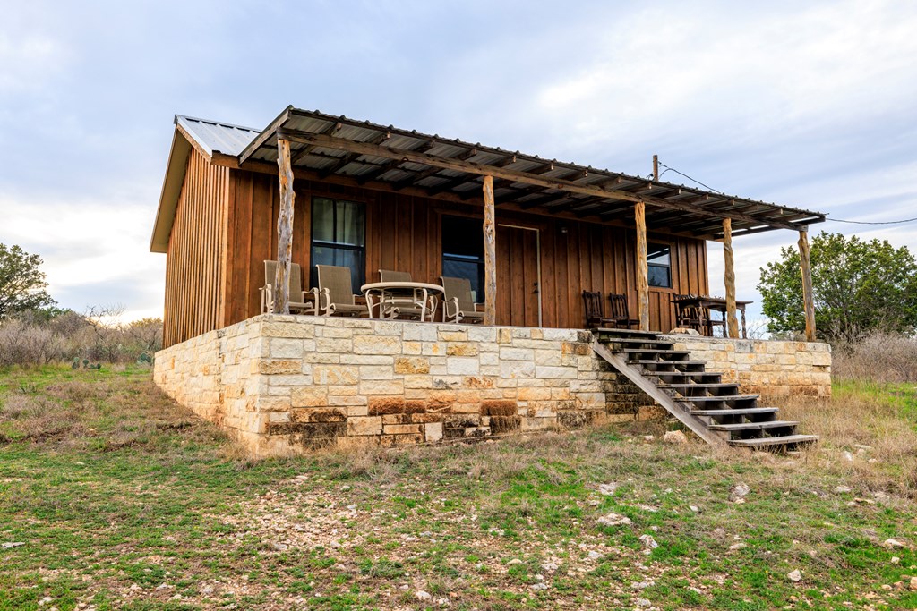 256 Persimmon Point Mason, TX 76856 - Photo 38 of 60 a view of a house with backyard and deck