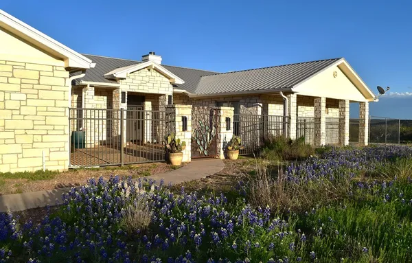 a living room with furniture fireplace and a flat screen tv