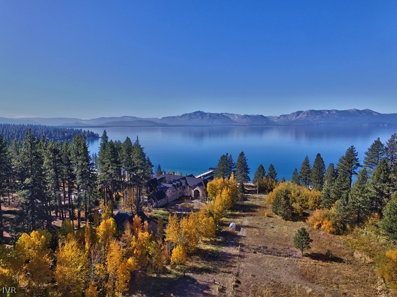550 Sierra Sunset Lane Zephyr Cove, NV 89448 - Photo 33 of 35 a view of a lake with a mountain in the background