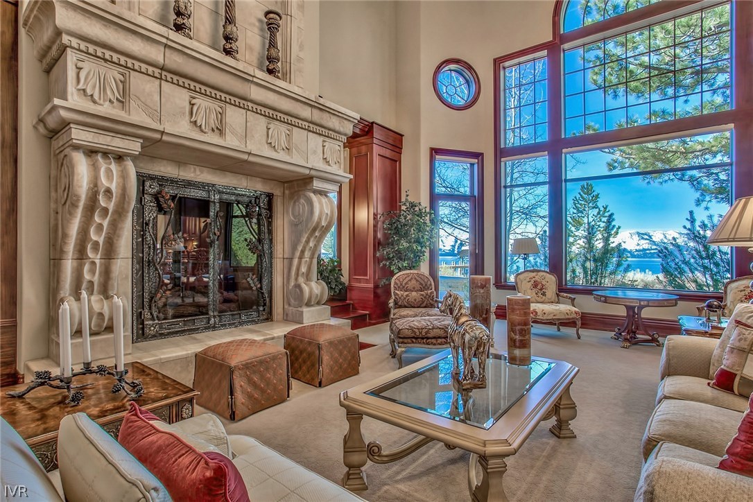 550 Sierra Sunset Lane Zephyr Cove, NV 89448 - Photo 7 of 35 a living room with furniture and a large window