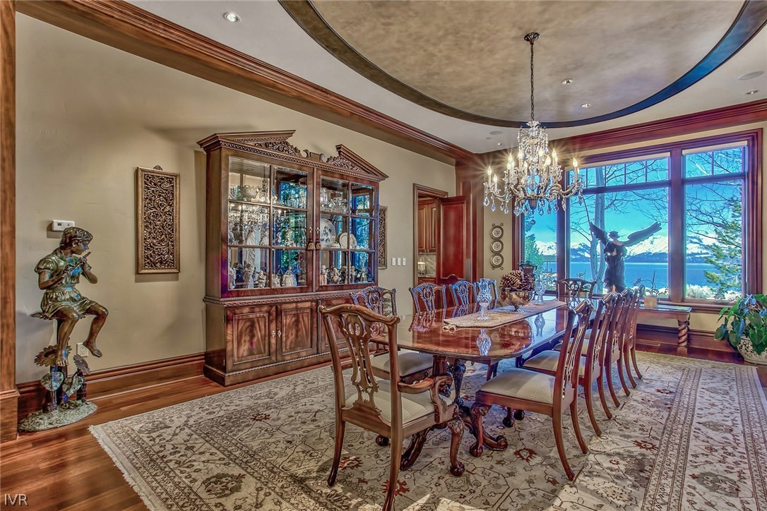 550 Sierra Sunset Lane Zephyr Cove, NV 89448 - Photo 8 of 35 a view of a dining room with furniture window and wooden floor