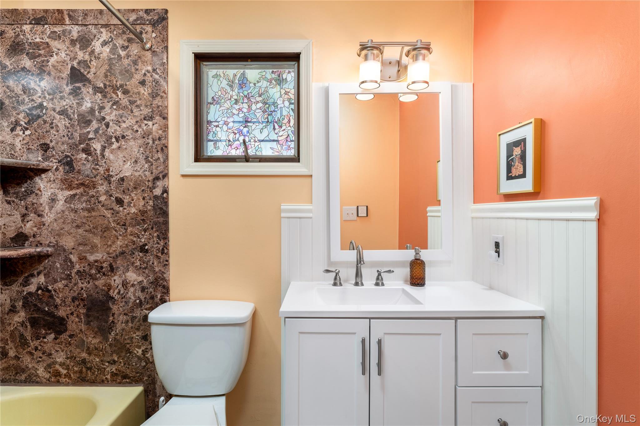 16 Daisy Place Selden, NY 11784 - Photo 13 of 19 a bathroom with a sink toilet and shower