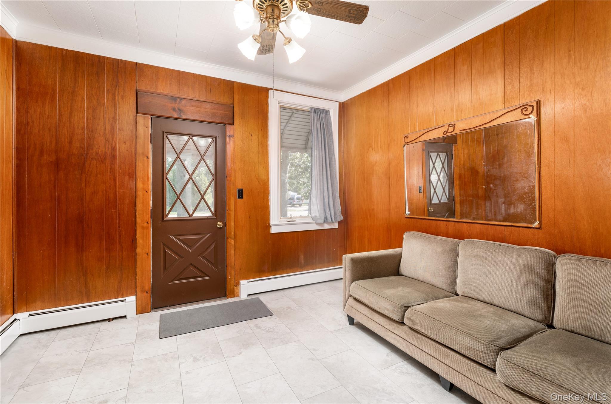16 Daisy Place Selden, NY 11784 - Photo 14 of 19 a living room with furniture and a window