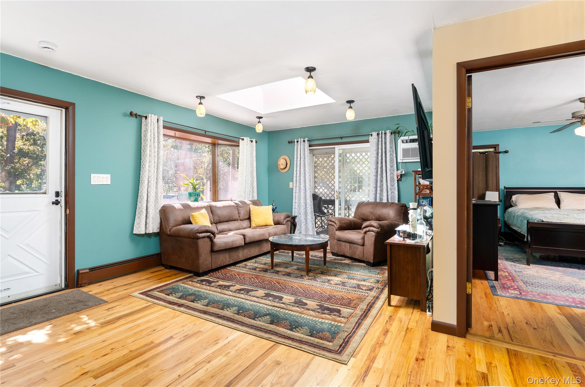 16 Daisy Place Selden, NY 11784 - Photo 5 of 19 a living room with furniture windows and a wooden floor