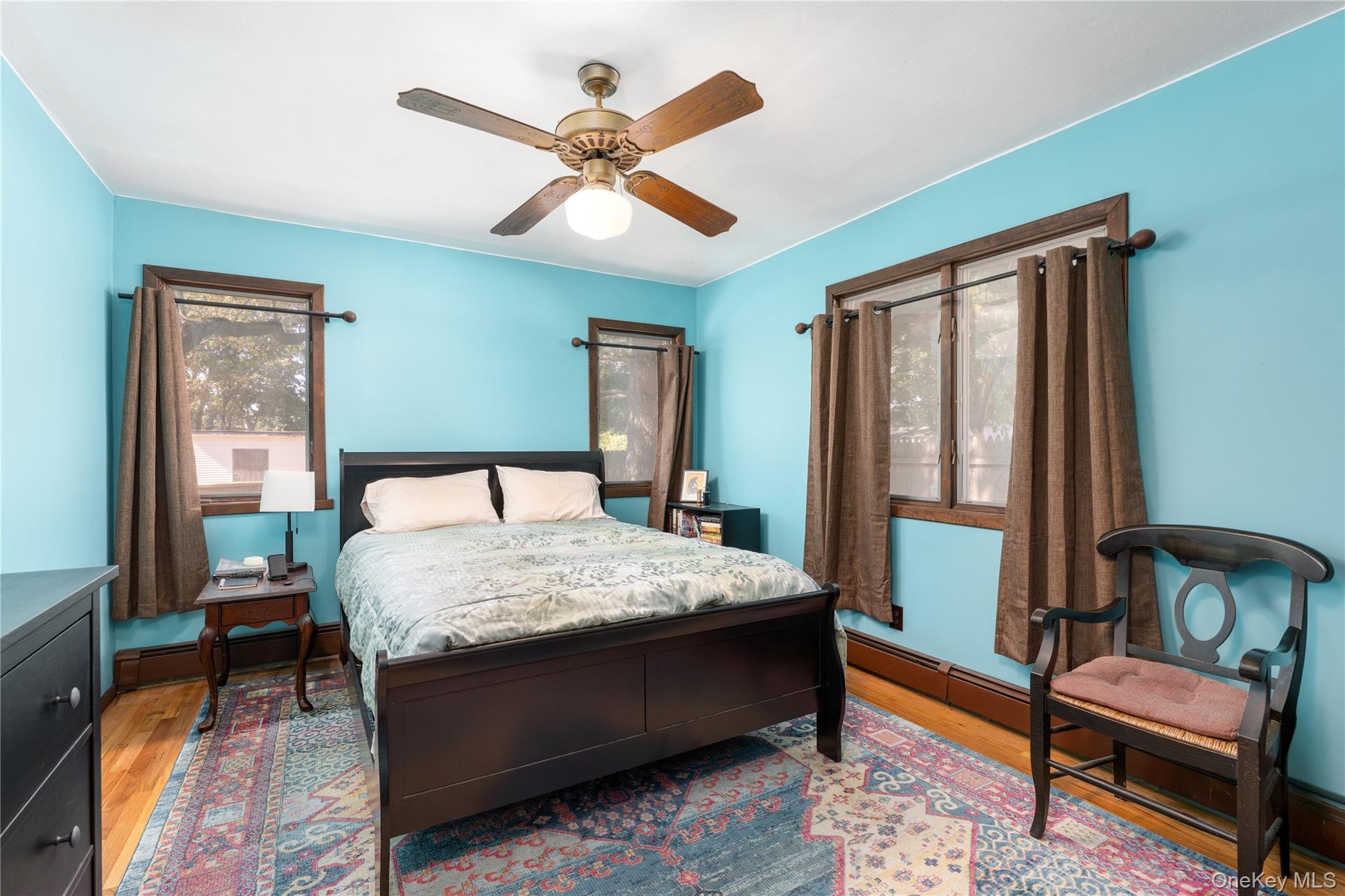 16 Daisy Place Selden, NY 11784 - Photo 10 of 19 a bed sitting in a bedroom next to a window