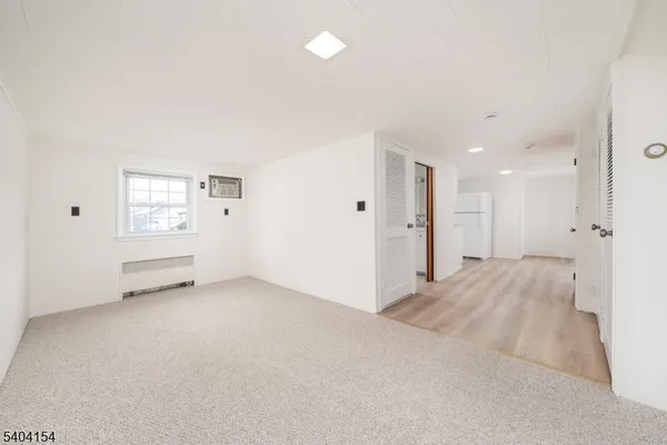 a view of empty room with windows