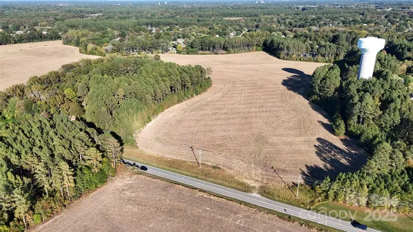 a view of a lake with a yard