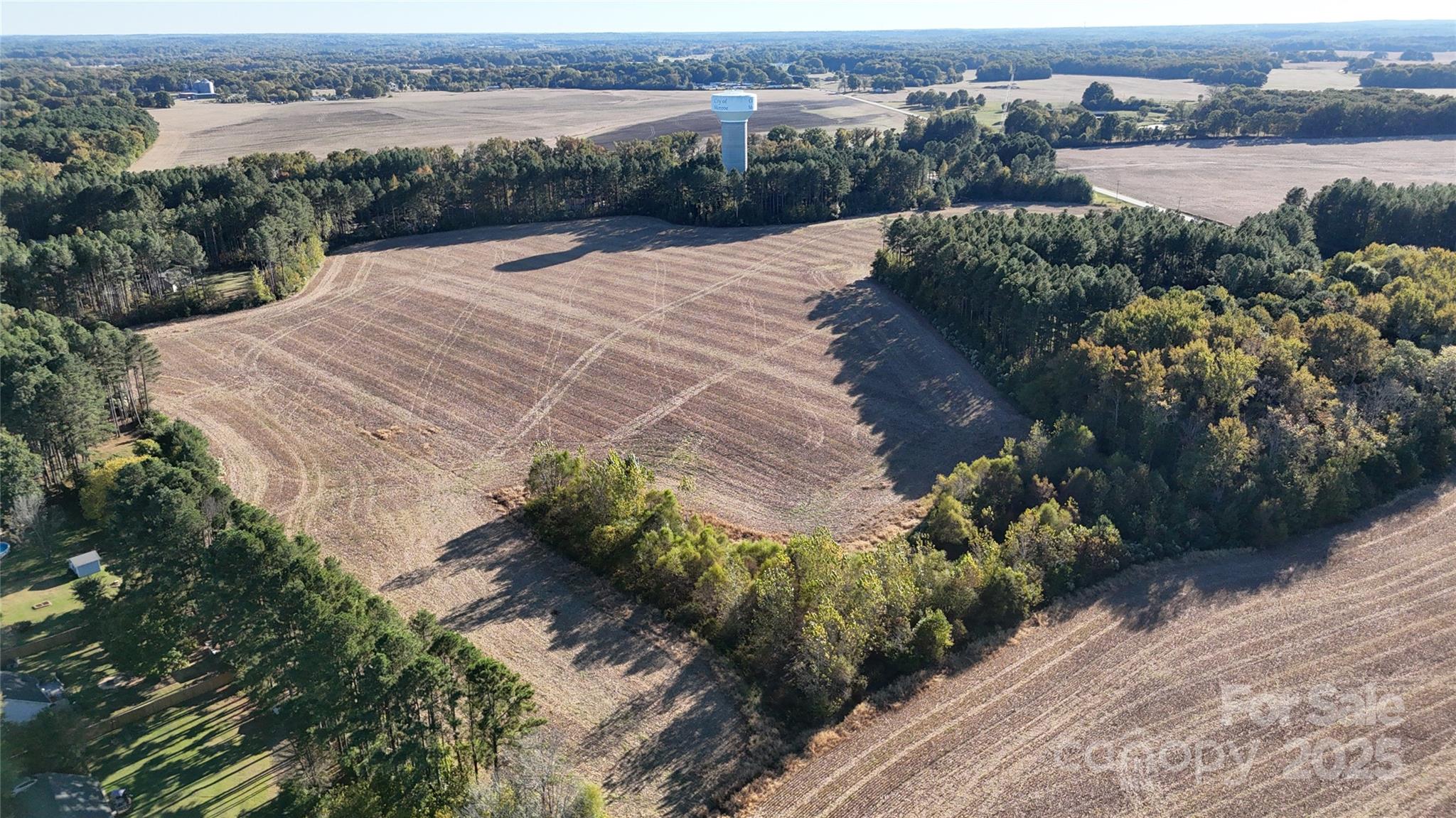 0 South Rocky River Road Monroe, NC 28110 - Photo 4 of 11 a view of a lake with a yard
