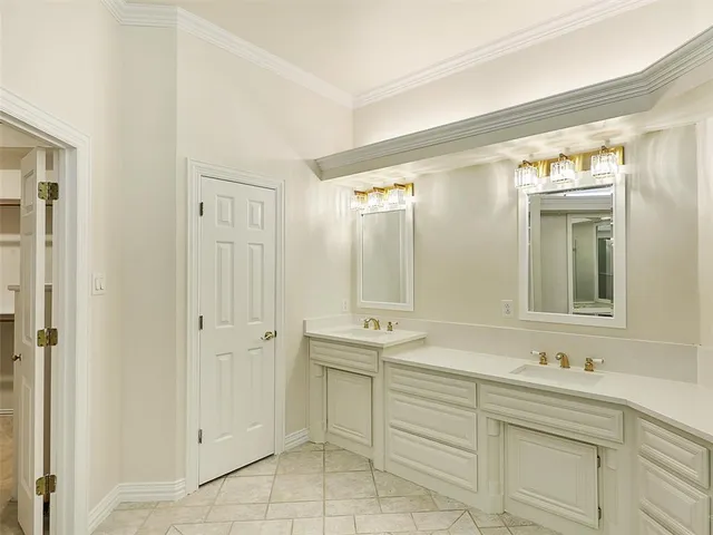 a bathroom with a shower sink and mirror