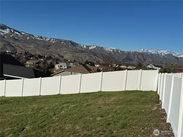a view of open space with a lake view