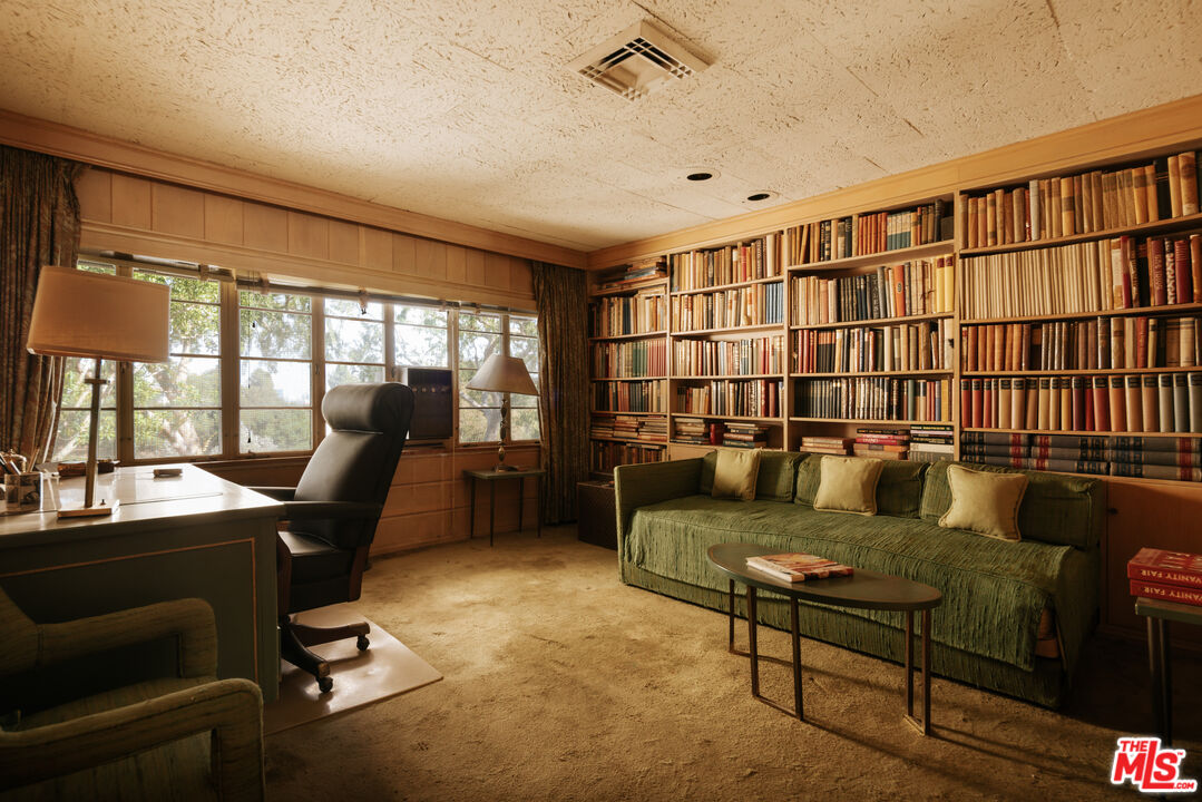 10934 Bellagio Road Los Angeles, CA 90077 - Photo 26 of 47 a work room with furniture and large windows