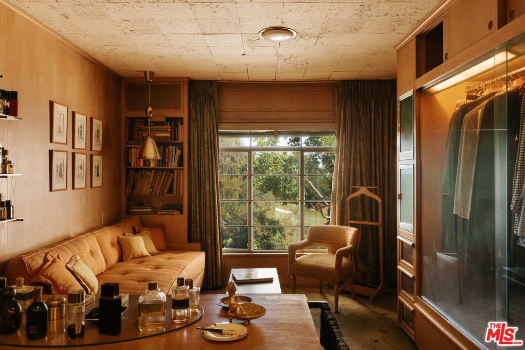 10934 Bellagio Road Los Angeles, CA 90077 - Photo 29 of 47 a living room with furniture and a large window