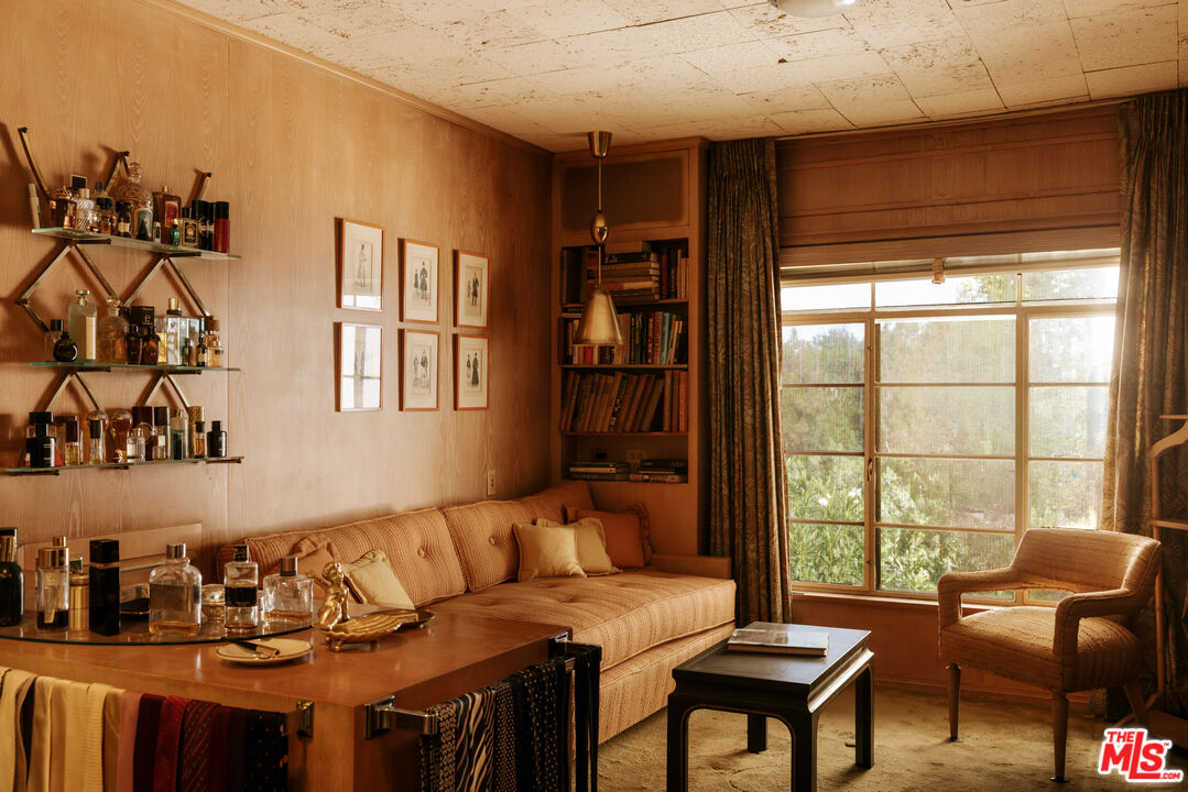 10934 Bellagio Road Los Angeles, CA 90077 - Photo 30 of 47 a living room with furniture and a window