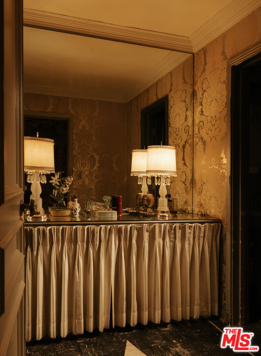 10934 Bellagio Road Los Angeles, CA 90077 - Photo 35 of 47 a view of a house with a wooden fence