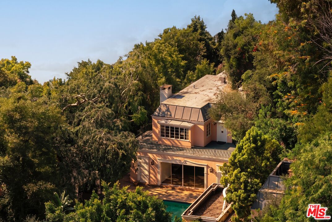 10934 Bellagio Road Los Angeles, CA 90077 - Photo 44 of 47 a view of a house with a tree