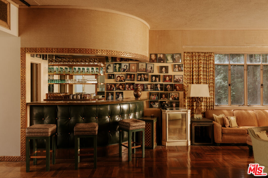 10934 Bellagio Road Los Angeles, CA 90077 - Photo 5 of 47 a view of a balcony with chairs