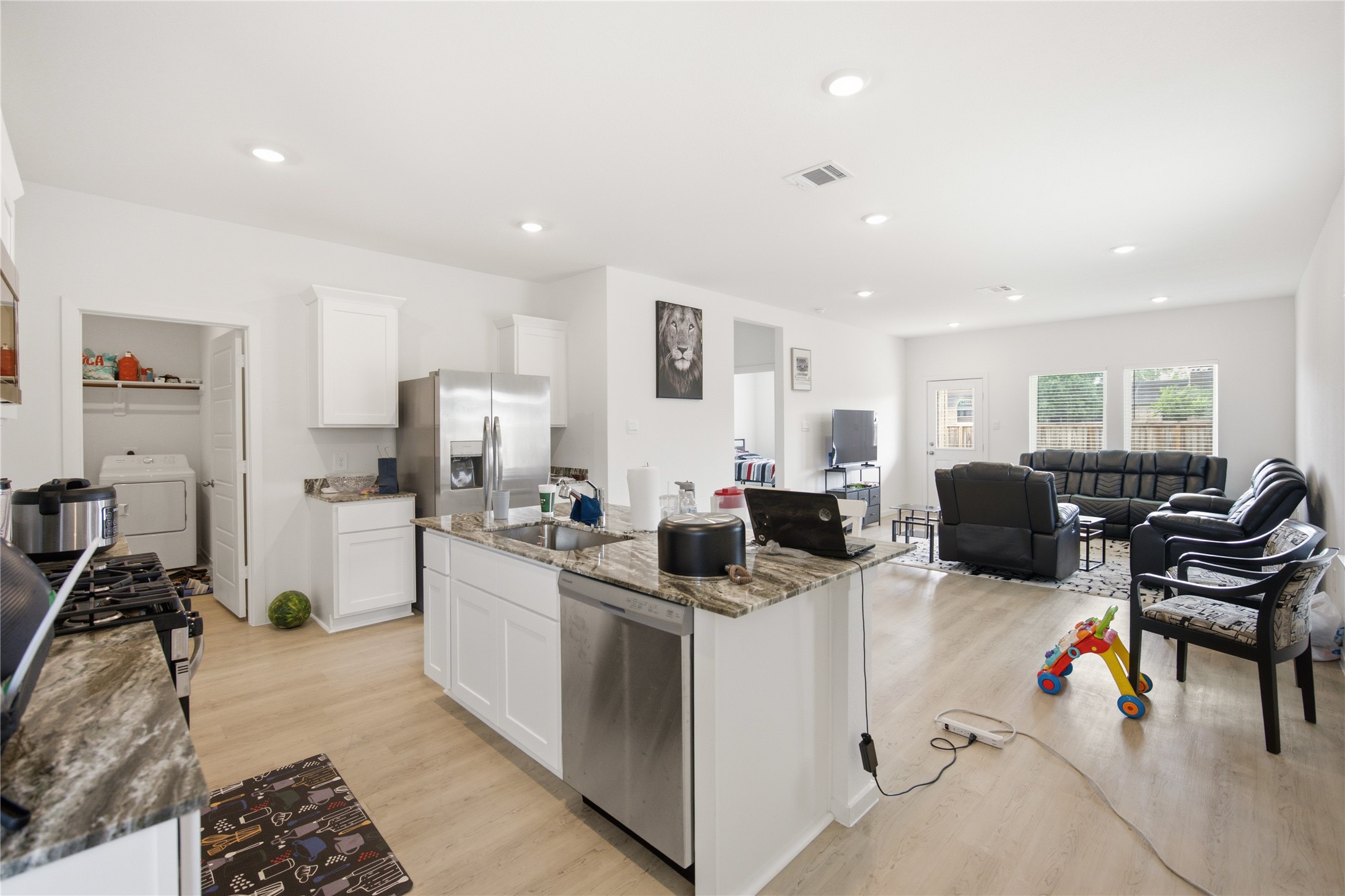 7 Robin Court Angleton, TX 77515 - Photo 7 of 27 Kitchen — Modern kitchen with stainless steel appliances.