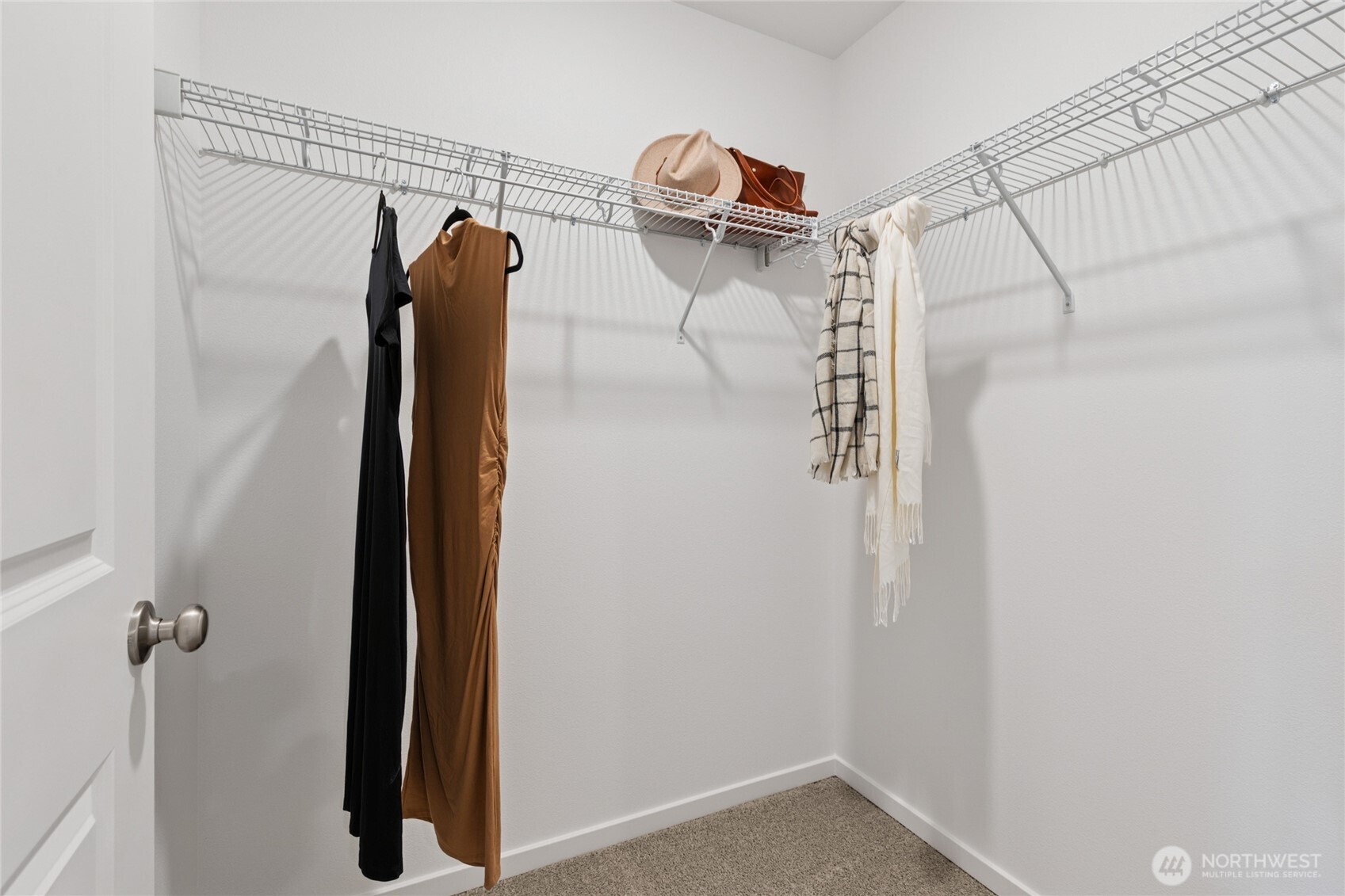 200 Cremini Loop Southeast, Unit 68 Lacey, WA 98513 - Photo 15 of 19 a view of walk in closet with clothes and shoes