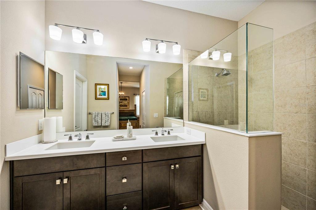 1759 Nottingham Trail Punta Gorda, FL 33980 - Photo 11 of 27 a bathroom with a double vanity sink mirror and double
