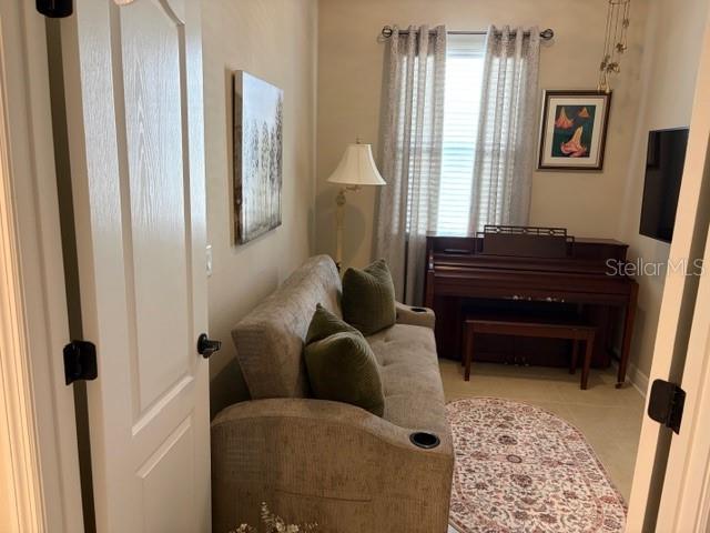 1759 Nottingham Trail Punta Gorda, FL 33980 - Photo 12 of 27 a living room with furniture and a window