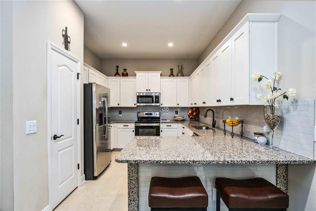 1759 Nottingham Trail Punta Gorda, FL 33980 - Photo 6 of 27 a kitchen with granite countertop lots of counter top space