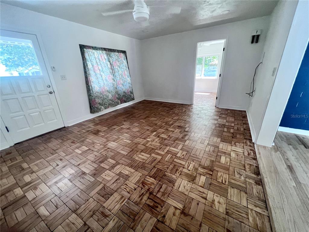 2707 Northwest 4th Avenue Gainesville, FL 32607 - Photo 9 of 31 an empty room with windows