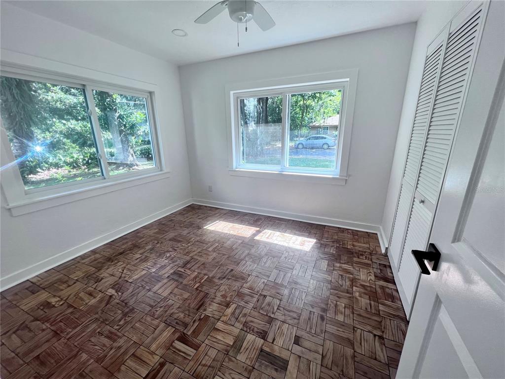 2707 Northwest 4th Avenue Gainesville, FL 32607 - Photo 10 of 31 a view of an empty room with a window