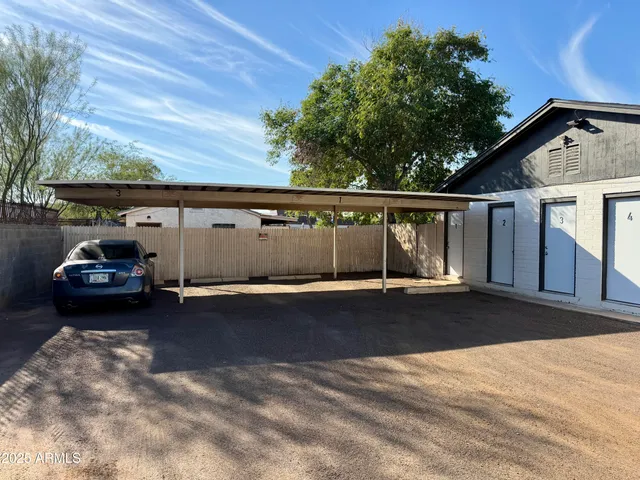 a car parked in front of a house