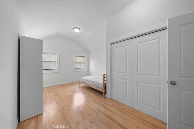 a view of livingroom with hardwood floor and hallway