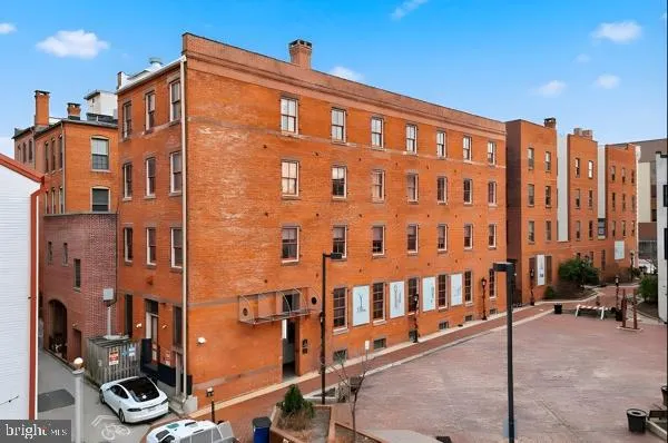 a front view of a building with glass windows