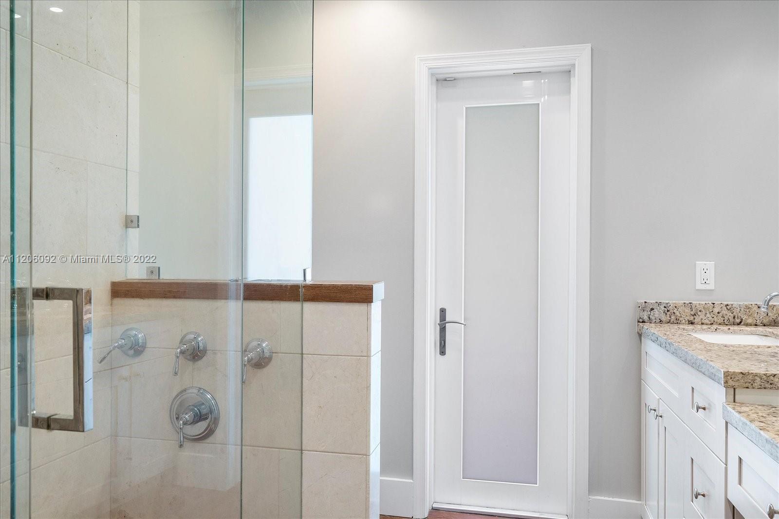 17300 Southwest 294th Street Homestead, FL 33030 - Photo 34 of 50 a utility room with cabinets washer and dryer