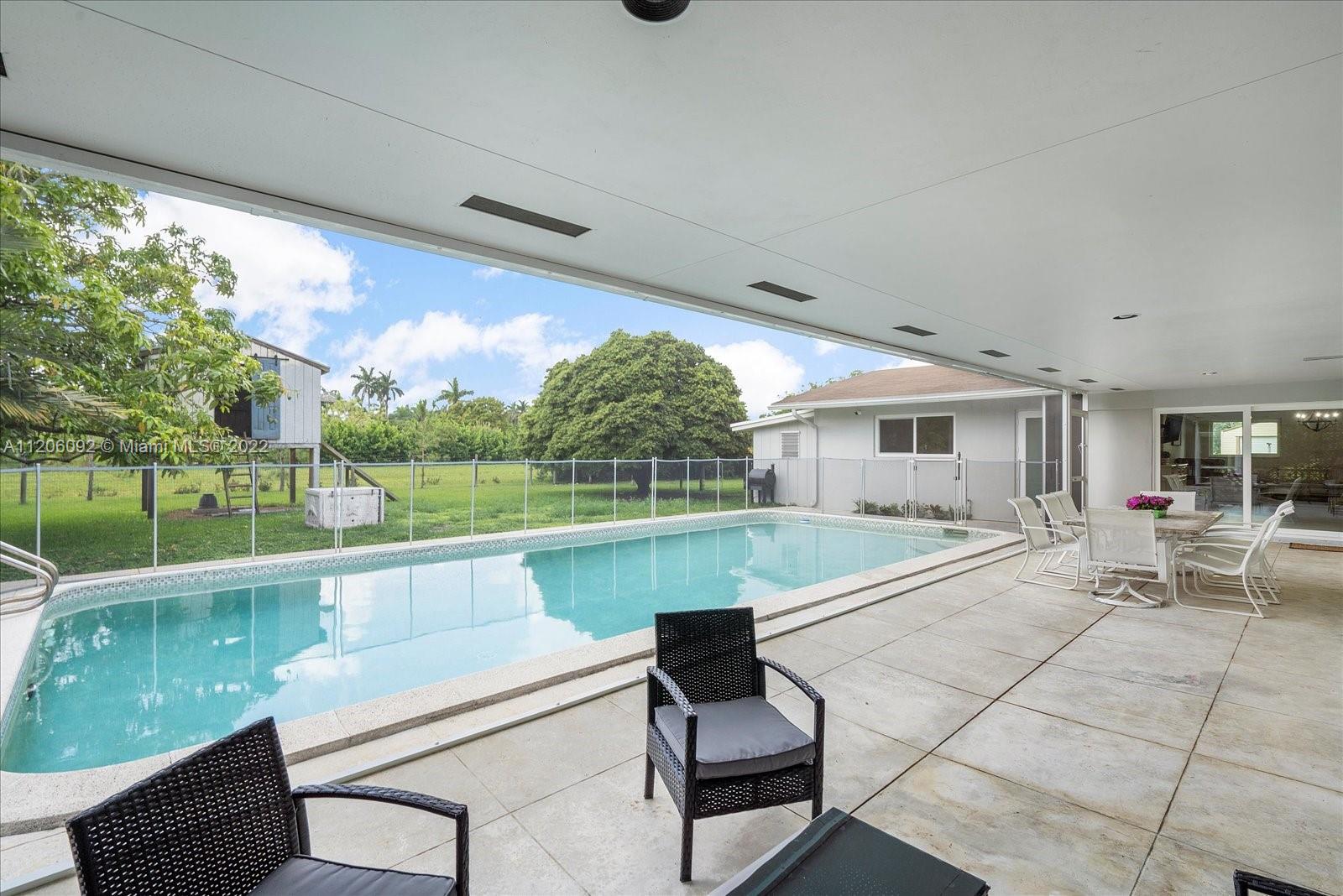 17300 Southwest 294th Street Homestead, FL 33030 - Photo 37 of 50 a outdoor view with a sitting space