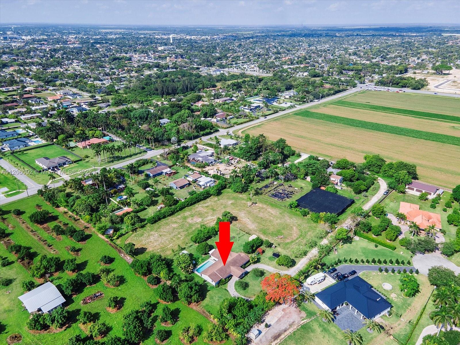 17300 Southwest 294th Street Homestead, FL 33030 - Photo 45 of 50 an aerial view of residential houses with outdoor space and trees