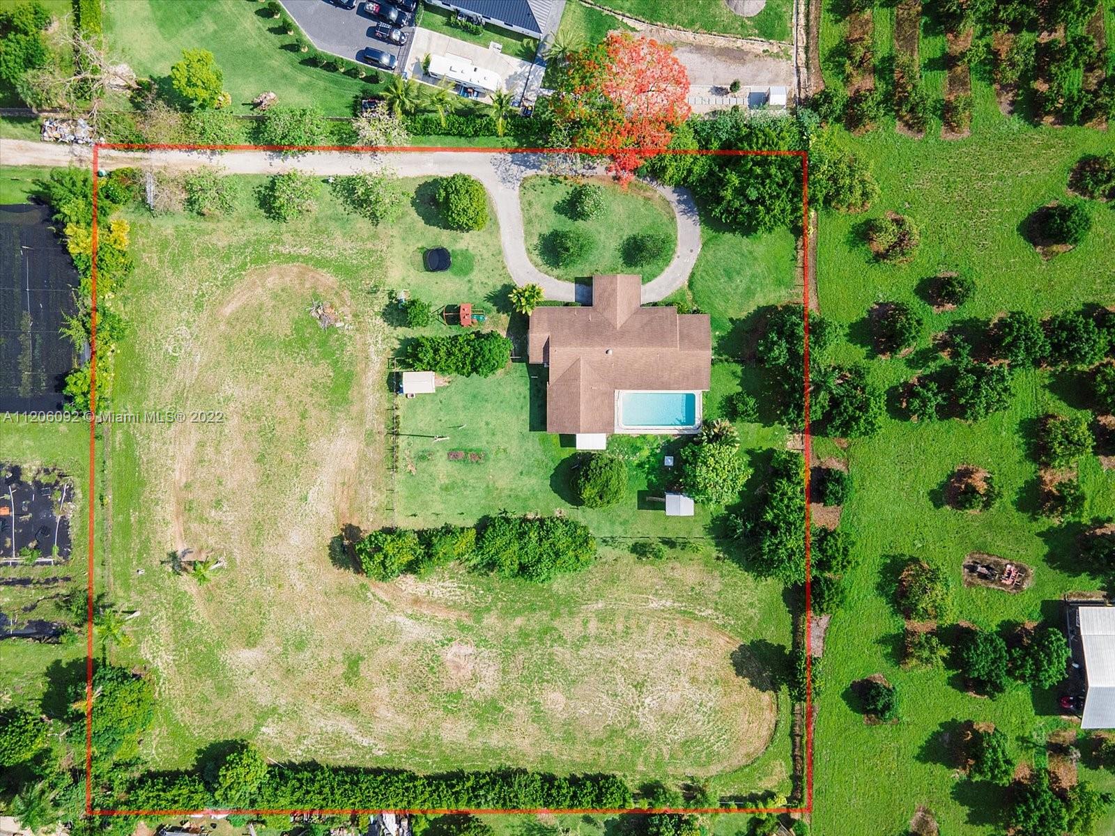 17300 Southwest 294th Street Homestead, FL 33030 - Photo 48 of 50 an aerial view of a house with a yard