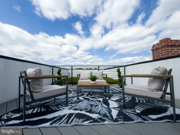 a terrace view with sitting space